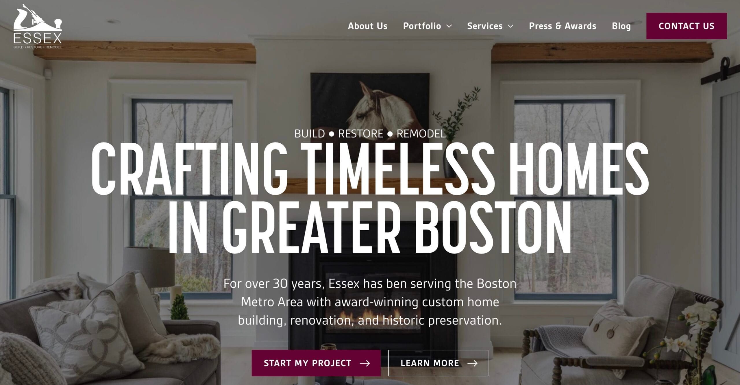 Home builder website hero reading Crafting Timeless Homes in Greater Boston, over a living room with a fireplace